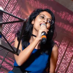 A close-up shot from a live performance. I love interacting with the audience and making sure the music connects with everyone in the room, whether it's a large hall or an intimate pub.