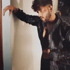 For a Diwali look, I styled Viraj Joshi in this dark, sequined jacket. It's a modern and glamorous take on festive wear for men, perfect for an evening celebration.