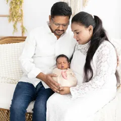 There is nothing more pure than new parents holding their greatest treasure. We focus on creating a calm and serene atmosphere for these first family portraits, using soft, natural light and simple white outfits to keep the focus on the love and connection.