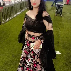 Another client looking fabulous in the black floral lehenga. The off-shoulder blouse and flowy skirt make it a flattering choice for all body types.