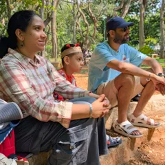 A family completely absorbed in a nature tale. I love seeing parents and children share these quiet, focused moments together, away from the distractions of daily life.