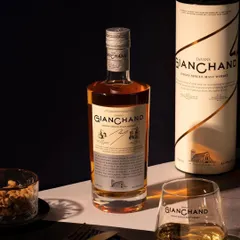 This moody shot for Gianchand whiskey uses strong contrast between light and shadow. The styling with the outer packaging and a glass of whiskey creates a complete, premium product story.