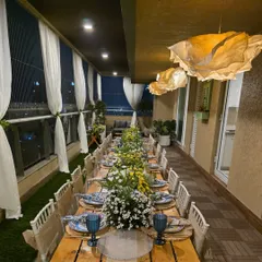 My live pizza catering fits perfectly into any celebration, like this beautifully decorated birthday dinner on a balcony. The setup is compact and designed to complement your event's ambiance.
