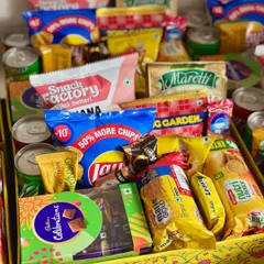 I love creating these super fun welcome baskets for out-of-town wedding guests! They are packed with a mix of sweet and savory snacks and drinks to make your guests feel right at home and ready for the celebrations.
