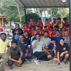 A group photo of our young players, parents, and coaches after a successful and fun-filled Community Fest.