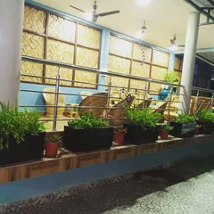 We transformed the patio of this resort with simple, elegant greenery. A series of rectangular planters filled with lush plants lines the space, creating a natural and relaxing environment for guests to enjoy.
