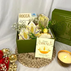 I take great pride in my corporate gifting, helping businesses share joy with their clients and employees. This elegant Diwali hamper shows how I can incorporate festive elements like lotus hangings and diyas into a professional and memorable gift.