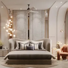 This bedroom is sculpted for serenity with soft curves and soothing vibes. From the walls to the ceiling, the seamless flow of curved forms and a contrasting sculptural chair bring a calm that you can feel.