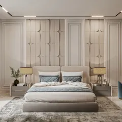 We create tranquil master bedrooms that serve as personal retreats. This design features a custom upholstered headboard with 3D paneling, elegant side tables, and layered lighting to create a calm and sophisticated atmosphere for restful nights.
