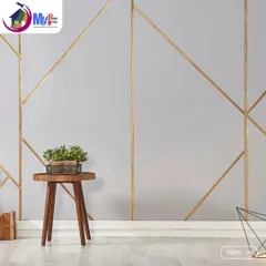 Looking for something unique? I can create custom accent walls, like this modern geometric design with gold lines. It's a sophisticated way to add character and a focal point to any room.