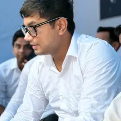 In deep thought during a meeting. Every case, whether it's a bail hearing or a child custody matter, requires careful strategy and attention to detail.