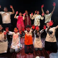 Our wonderful group of students and instructors posing together after a fun-filled Holi dance celebration.