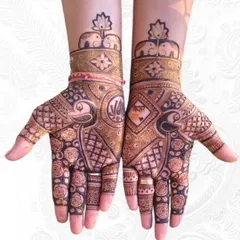 This Teej design features adorable elephants under a lotus canopy, with peacocks and floral patterns on the palms.