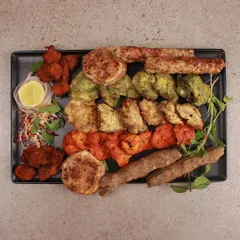 Can't decide what to order? Our non-veg platter is the answer. It’s a feast of our best offerings, including chicken tikka, mutton seekh, and galouti kebabs, perfect for sharing or for a big appetite.