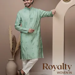 Royalty woven in. A full look of a model in a mint green printed kurta, leaning casually, showcasing its relaxed yet stylish vibe.