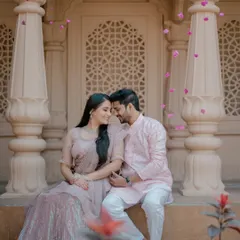 I love creating grand, fairytale-like images. Here, we used the stunning architecture to frame the couple, with flower petals adding a touch of magic. This is for couples who dream of a pre-wedding shoot that feels both royal and romantic.