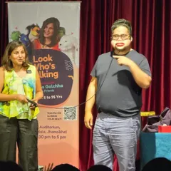 A close-up of the human puppet act. The volunteer's reactions are just as funny as the routine itself.