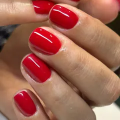 The classic red manicure, perfected. Our Russian manicure technique allows the polish to be applied right up to the cuticle for a clean look that grows out beautifully.