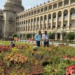 A candid moment of inspection during our work at the Vidhana Soudha. We ensure that every plant is healthy and perfectly positioned to create a flawless and lasting impression for all visitors.