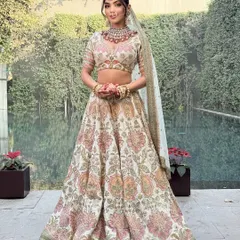 The full look of the Sabyasachi bride, showcasing the perfect balance of traditional motifs and a modern color palette. The styling is effortless and elegant.