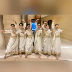 My talented female dancers from the troupe, ready to bring grace and energy to the stage in their beautiful coordinated costumes.