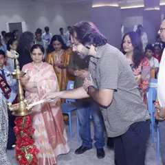 Kicking off an art event at a school with the traditional lamp lighting ceremony. I believe art is a powerful tool for education and inspiration, and I am always happy to bring that experience to students and faculty.