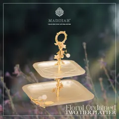 The Floral Ordained Two-Tier Platter from my Silvered Collection. Crafted by skilled artisans, this piece is perfect for elevating any occasion with its sophisticated and graceful design.