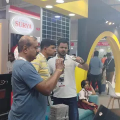 Here I am at an exhibition, personally demonstrating the features of my home automation products to interested visitors. I believe in hands-on explanations to show the true value of my services.