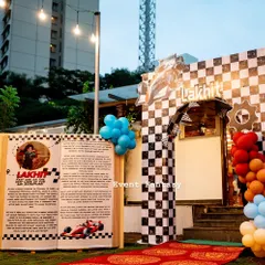 A creative storybook entrance for Lakhit's first race. The giant open book tells a personalized story about the birthday boy's first year.