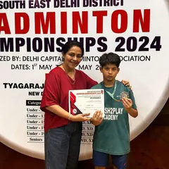 One of our young champions receiving her medal and certificate. My academy focuses on nurturing talent from a young age and providing a platform for them to compete.