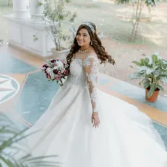 A timeless look for a modern fairytale. For this Christian wedding, I created a soft, romantic glam with a dewy finish, gentle curls, and a touch of sparkle to complement her beautiful white gown, ensuring she looked radiant from the aisle to the reception.