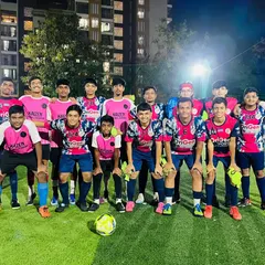 Both our team and Kaizen FC posing together, a great display of sportsmanship after a hard-fought practice match.