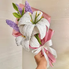 A beautiful custom bouquet featuring handcrafted crochet lilies and lavender. This shows the intricate detail and artistry we put into our floral arrangements, making them a perfect everlasting gift.