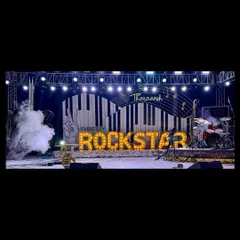 This Rockstar concert party featured a full stage setup with professional lighting trusses, giant piano key backdrops, and marquee letters to make the birthday boy feel like a true star.