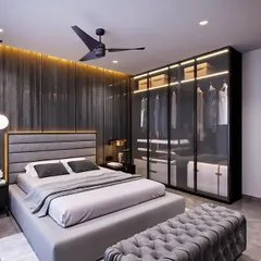 For this master bedroom, the client wanted a dark and moody yet sophisticated vibe. I used a palette of deep greys, a fluted wood accent wall with integrated backlighting, and a glass wardrobe to create a space that feels both dramatic and serene.