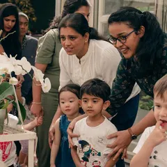 I believe in taking learning outside the classroom. Here, we're on a nature walk to a local plant nursery, where the children got to see, touch, and smell different flowers and plants. These real-world experiences are invaluable for sparking a child's natural curiosity.