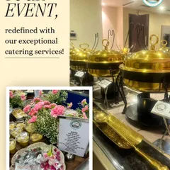 Your event, redefined with our exceptional catering. This image captures the beauty of our buffet service, where floral arrangements and elegant serveware complement the delicious food, creating a truly memorable dining experience.