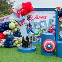 We assembled an epic Marvel universe for Aliyaar's birthday, featuring a dynamic city backdrop with Spiderman, the Hulk, and Captain America. The setup included iconic props like Cap's shield and Thor's hammer for a truly heroic party.