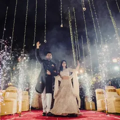 Your Sangeet entry should be nothing short of spectacular. Here, we created a magical moment for the couple with a pathway of cold pyro fireworks and a canopy of twinkling fairy lights for a truly grand entrance.