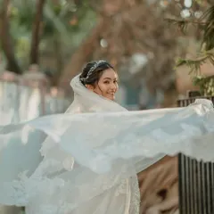 For my Catholic brides, I aim for an ethereal and timeless elegance. This look features soft, romantic makeup and a simple yet sophisticated hairstyle, allowing the bride's natural beauty to shine through her veil.
