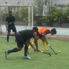 A classic one-on-one showdown during a Sunday friendly game. These moments are where players test their tackling and dribbling skills under pressure.
