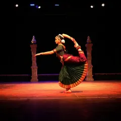 A challenging pose known as Natarajasana, representing Lord Shiva as the cosmic dancer. This requires immense balance and flexibility, embodying the dynamic energy of Shiva.