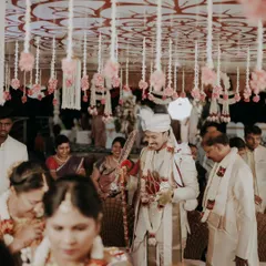 A candid shot of the groom during the Kashi Yatre ritual, capturing the fun and traditional aspects of a South Indian wedding.