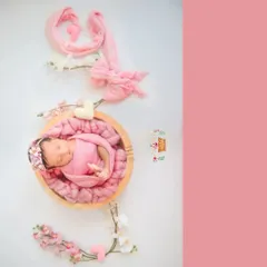 Pretty in pink. This overhead shot shows how I arrange delicate fabrics and flowers to create a beautiful, artistic frame around your sleeping baby, like a little work of art.