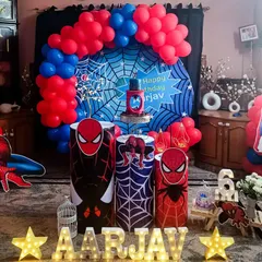 An action-packed Spider-Man theme birthday party. This custom setup includes a web-slinging backdrop, character cutouts, and themed pedestals to make any little hero's dream come true.