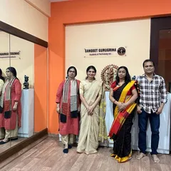 Our gurus with the esteemed examiners, marking the end of a successful session.