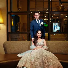 A classic portrait of the happy couple. The soft, cascading waves and luminous makeup make the bride look absolutely stunning and timeless.