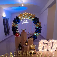 Celebrating a 60th birthday is a huge milestone, and it deserves an elegant touch. For this setup, I used a classic royal blue and gold theme with a large balloon ring, marquee numbers, and custom name lighting to create a sophisticated and personal backdrop for the celebration.