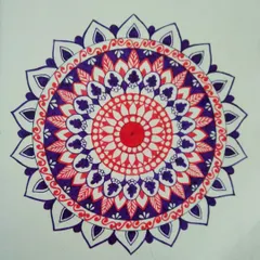 This mandala uses a simple but powerful combination of red and violet. For me, art is an escape, and choosing colors is a way to express my mood, whether I'm happy or sad.