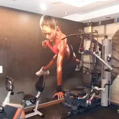 This powerful, large-scale mural of an athlete in a gym setting is designed to motivate and inspire. The dynamic image creates a high-energy environment, pushing gym-goers to reach their fitness goals.